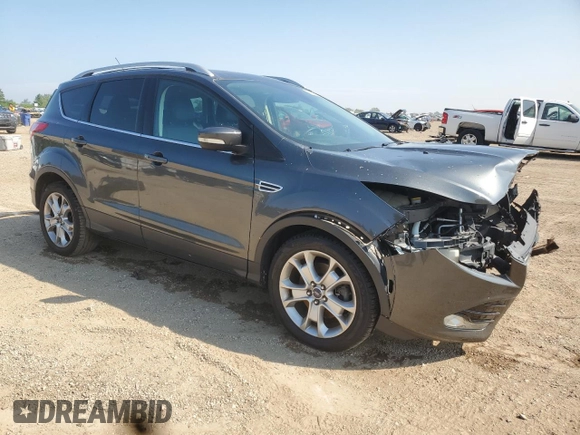 2016 Ford Escape Titanium with VIN 1FMCU9J98GUB32375, listed as a Copart auction lot 59564885 with 123,548 mi miles and Salvage title. Bid and sale history available at DreamBid. Image 4.