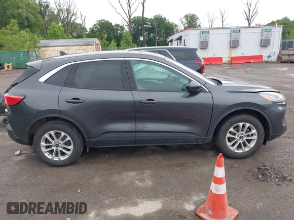 2020 Ford Escape SE with VIN 1FMCU9G64LUA25167, listed as a IAAI auction lot 42307557 with 82,524 mi miles and . Bid and sale history available at DreamBid. Image 14.
