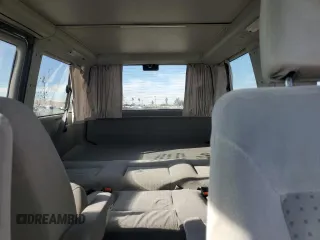 2003 Volkswagen EuroVan MV с VIN WV2NB47043H011247, выставлен на аукционе Copart как лот 85056064 с пробегом 190 282 миль миль и Списание • Salvage title. История ставок и продаж доступна на DreamBid. Изображение 10.