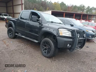 2007 Nissan Titan SE with VIN 1N6BA07A17N212890, listed as a IAAI auction lot 41034412 with 211,881 mi miles and . Bid and sale history available at DreamBid. Image 1.