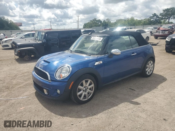 2015 MINI Convertible S with VIN WMWZP3C59F2A91231, listed as a Copart auction lot 59296415 with 31,642 mi miles and Salvage title. Bid and sale history available at DreamBid. Image 1.