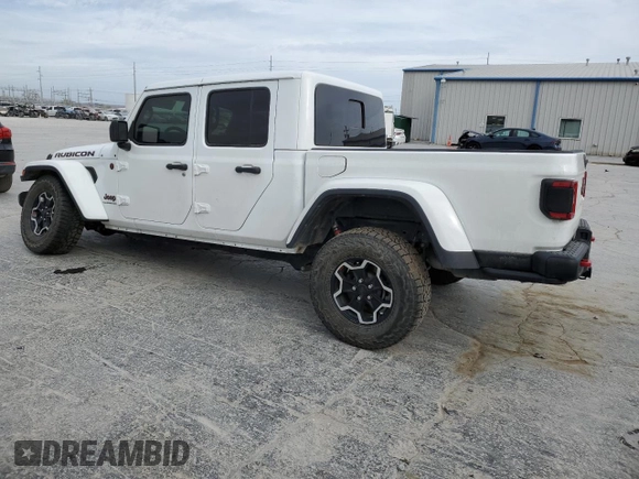 2020 Jeep Gladiator Rubicon z VIN 1C6JJTBG3LL156802, wystawiony jako Copart lot #48904865 z przebiegiem 30 704 mil mil oraz Szkoda całkowita • Salvage title. Historia ofert i sprzedaży dostępna na DreamBid. Obrazek 2.
