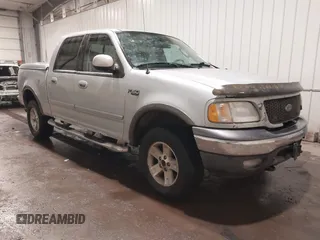 2003 Ford F-150 XLT with VIN 1FTRW08L83KA45989, listed as a IAAI auction lot 41048095 with 226,328 mi miles. Bid and sale history available at carsss.com. Image 1.