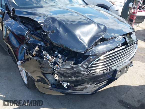 2020 Ford Fusion Hybrid SE with VIN 3FA6P0LU9LR161722, listed as a IAAI auction lot 42187436 with 49,376 mi miles. Bid and sale history available at carsss.com. Image 6.