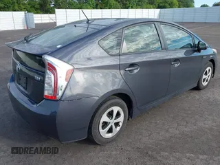 2013 Toyota Prius One with VIN JTDKN3DU7D1714636, listed as a IAAI auction lot 42207541 with 214,977 mi miles and . Bid and sale history available at DreamBid. Image 4.