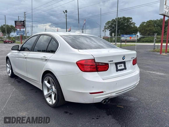 2015 BMW 3 Series 328i xDrive with VIN WBA3B5C59FP654679, listed as a Copart auction lot 59805525 with 120,885 mi miles and Clean title. Bid and sale history available at DreamBid. Image 3.