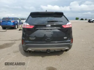 2019 Ford Edge SEL with VIN 2FMPK4J93KBC26513, listed as a Copart auction lot 59301295 with 58,364 mi miles and Salvage title. Bid and sale history available at DreamBid. Image 6.