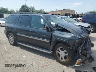 2003 GMC Envoy SLT with VIN 1GKET16S336137595, listed as a Copart auction lot 61498264 with Not Provided miles and Salvage Title. Bid and sale history available at DreamBid. Image 4.