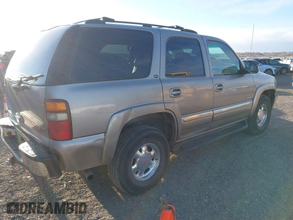 2002 GMC Yukon SLT with VIN 1GKEK13Z52J263912, listed as a IAAI auction lot 41799085 with 340,006 mi miles. Bid and sale history available at carsss.com. Image 4.