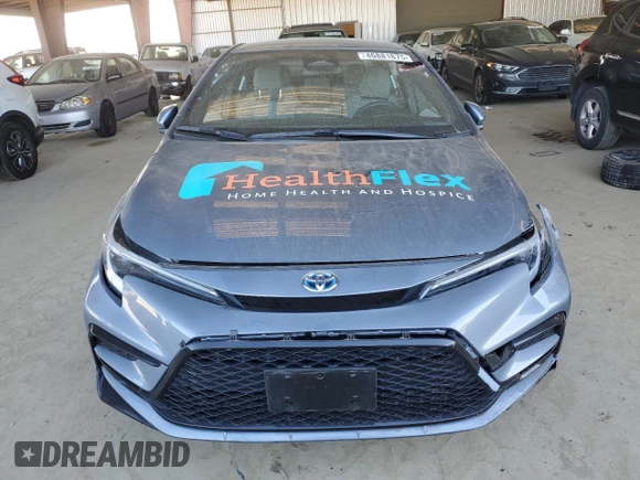 2023 Toyota Corolla Hybrid LE with VIN JTDBCMFE9P3013378, listed as a Copart auction lot 46881875 with 22,183 mi miles and Salvage Title. Bid and sale history available at carsss.com. Image 5.