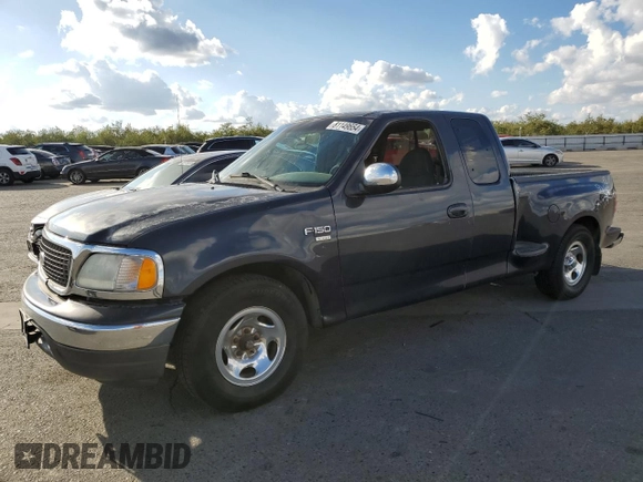 2000 Ford F-150 with VIN 1FTRX07W3YKA56561, listed as a Copart auction lot 81149654 with 185,967 mi miles and Salvage title. Bid and sale history available at DreamBid. Image 1.