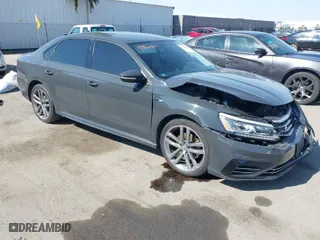2018 Volkswagen Passat 2.0T S with VIN 1VWAA7A34JC025600, listed as a IAAI auction lot 41594079 with 92,019 mi miles. Bid and sale history available at carsss.com. Image 1.