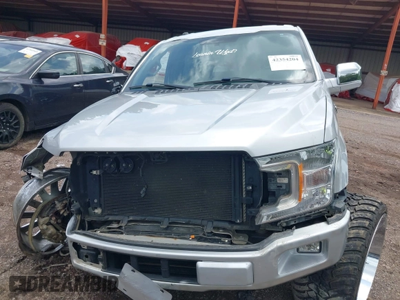 2018 Ford F-150 XL z VIN 1FTEW1CP4JFB37718, wystawiony jako IAAI lot #42354204 z przebiegiem 141 689 mil mil oraz . Historia ofert i sprzedaży dostępna na DreamBid. Obrazek 6.