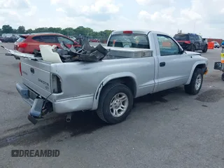 2004 Dodge Dakota z VIN 1D7FL16K04S554963, wystawiony jako IAAI lot #40128365 z przebiegiem 72 818 mil mil oraz . Historia ofert i sprzedaży dostępna na DreamBid. Obrazek 4.