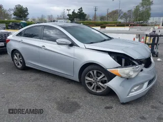 2012 Hyundai Sonata 2.4L Limited PZEV with VIN 5NPEC4AC9CH314413, listed as a IAAI auction lot 41921422 with 142,897 mi miles. Bid and sale history available at carsss.com. Image 1.