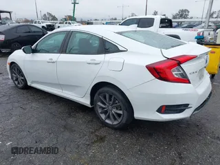 2021 Honda Civic Sedan EX-L with VIN 19XFC1F77ME205128, listed as a IAAI auction lot 41562202 with 82,257 mi miles. Bid and sale history available at carsss.com. Image 3.