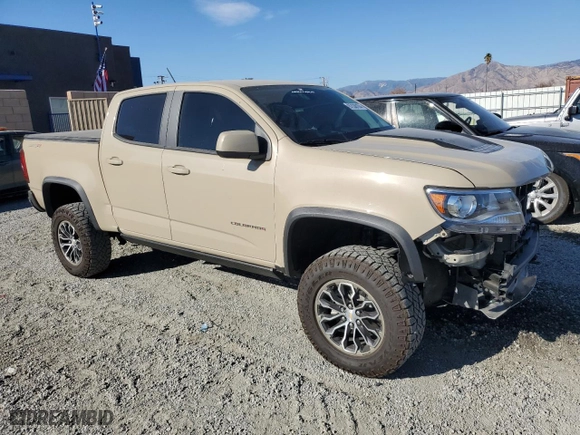 2022 Chevrolet Colorado 4WD ZR2 with VIN 1GCGTEEN4N1271054, listed as a Copart auction lot 87038104 with 13,697 mi miles and Salvage Title. Bid and sale history available at carsss.com. Image 4.