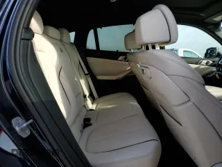 2025 BMW X6 M60i with VIN 5UX43EX01S9X19069, listed as a Copart auction lot 42613105 with 6,909 mi miles and Salvage Title. Bid and sale history available at carsss.com. Image 10.