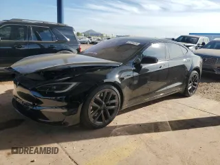 2022 Tesla Model S with VIN 5YJSA1E51NF474743, listed as a Copart auction lot 87316374 with Not Provided miles and Salvage Title. Bid and sale history available at DreamBid. Image 1.