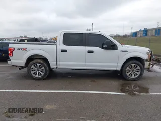 2018 Ford F-150 XL with VIN 1FTEW1E59JKD99284, listed as a IAAI auction lot 41203530 with 153,800 mi miles. Bid and sale history available at carsss.com. Image 13.