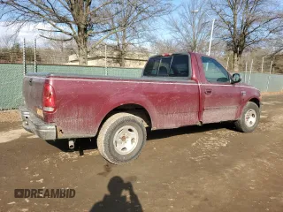 1999 Ford F-150 with VIN 1FTRF17W7XNA44872, listed as a Copart auction lot 41815695 with 182,678 mi miles and Salvage title. Bid and sale history available at DreamBid. Image 3.