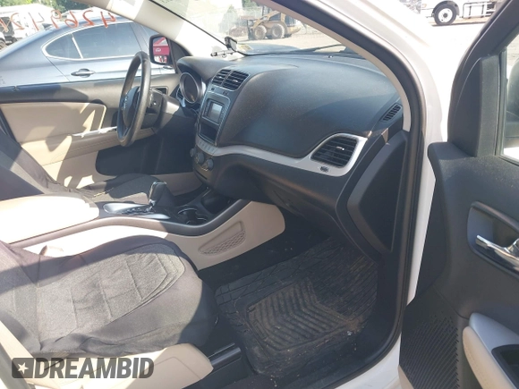 2017 Dodge Journey SXT z VIN 3C4PDCBG3HT537331, wystawiony jako IAAI lot #42694213 z przebiegiem 193 609 mil mil oraz . Historia ofert i sprzedaży dostępna na DreamBid. Obrazek 5.