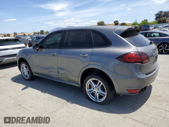 2013 Porsche Cayenne GTS with VIN WP1AD2A27DLA75169, listed as a Copart auction lot 56705735 with 148,880 mi miles and Salvage title. Bid and sale history available at DreamBid. Image 2.