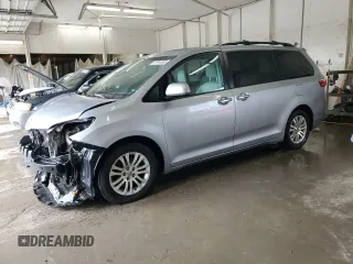 2016 Toyota Sienna XLE with VIN 5TDYK3DCXGS738530, listed as a Copart auction lot 61944505 with 254,176 mi miles and Salvage title. Bid and sale history available at DreamBid. Image 1.
