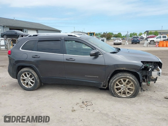 2017 Jeep Cherokee Latitude with VIN 1C4PJMCBXHW515628, listed as a IAAI auction lot 42295318 with 88,923 mi miles and . Bid and sale history available at DreamBid. Image 14.