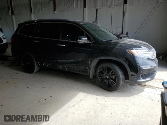 2021 Honda Pilot Touring 8-Passenger with VIN 5FNYF6H97MB062638, listed as a Copart auction lot 50876815 with 49,662 mi miles and Salvage title. Bid and sale history available at DreamBid. Image 4.