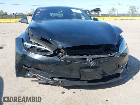 2023 Tesla Model S with VIN 5YJSA1E54PF531021, listed as a IAAI auction lot 42014104 with Not provided miles and . Bid and sale history available at DreamBid. Image 6.