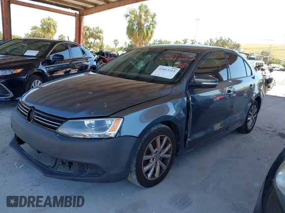 2012 Volkswagen Jetta Sedan SE w/Convenience with VIN 3VWDX7AJ6CM407834, listed as a IAAI auction lot 42013215 with 168,035 mi miles. Bid and sale history available at carsss.com. Image 2.