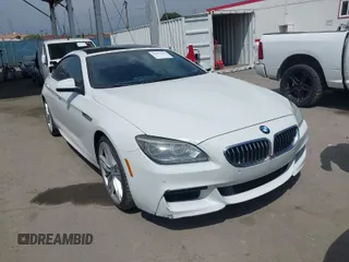 2015 BMW 6 Series 640i with VIN WBA6A0C56FD318007, listed as a IAAI auction lot 42041430 with 78,281 mi miles. Bid and sale history available at carsss.com. Image 1.