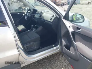 2013 Volkswagen Tiguan S z VIN WVGBV3AX2DW601982, wystawiony jako IAAI lot #42604058 z przebiegiem 141 016 mil mil oraz . Historia ofert i sprzedaży dostępna na DreamBid. Obrazek 5.