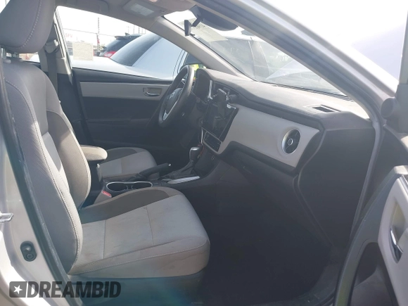 2019 Toyota Corolla L with VIN 2T1BURHE2KC190975, listed as a IAAI auction lot 41901370 with 94,925 mi miles. Bid and sale history available at carsss.com. Image 5.