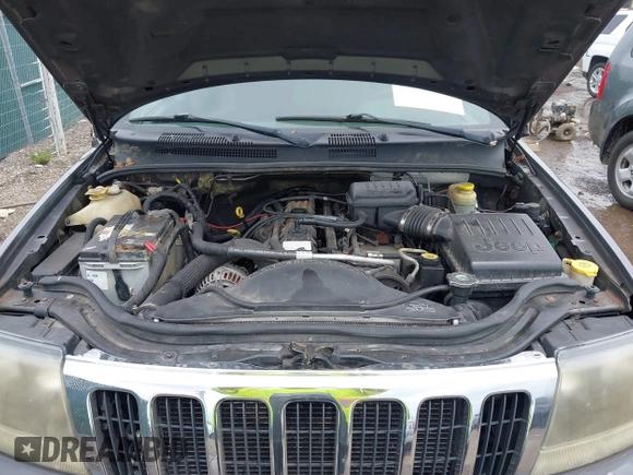 2003 Jeep Grand Cherokee Laredo z VIN 1J4GW48S73C545863, wystawiony jako IAAI lot #42222247 z przebiegiem 128 529 mil mil oraz . Historia ofert i sprzedaży dostępna na DreamBid. Obrazek 10.