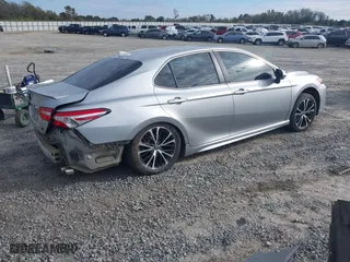 2020 Toyota Camry SE with VIN 4T1J11AKXLU879877, listed as a IAAI auction lot 40827028 with 176,872 mi miles. Bid and sale history available at carsss.com. Image 4.