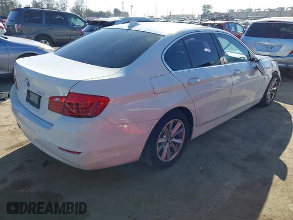 2015 BMW 5 Series 528i with VIN WBA5A5C56FD512769, listed as a IAAI auction lot 40832378 with 113,669 mi miles. Bid and sale history available at carsss.com. Image 4.