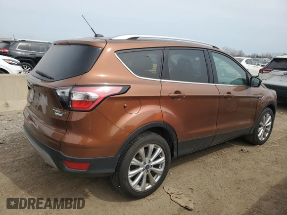 2017 Ford Escape Titanium with VIN 1FMCU0JD4HUC85921, listed as a Copart auction lot 51490945 with 90,093 mi miles and Salvage Title. Bid and sale history available at carsss.com. Image 3.