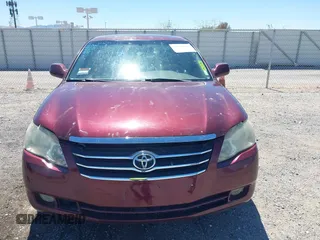2006 Toyota Avalon XL with VIN 4T1BK36B36U087385, listed as a IAAI auction lot 41986866 with 128,594 mi miles. Bid and sale history available at carsss.com. Image 6.