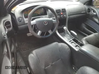 2004 Pontiac GTO z VIN 6G2VX12G04L223636, wystawiony jako Copart lot #56859295 z przebiegiem 183 192 mil mil oraz Szkody całkowita. Historia ofert i sprzedaży dostępna na DreamBid. Obrazek 8.