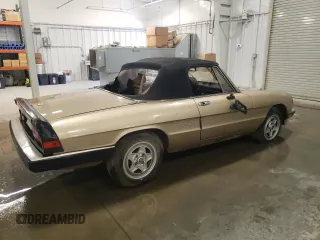 1986 Alfa Romeo Spider Veloce z VIN ZARBA541XG1037976, wystawiony jako Copart lot #50330035 z przebiegiem 47 885 mil mil oraz Szkoda całkowita • Salvage title. Historia ofert i sprzedaży dostępna na DreamBid. Obrazek 3.