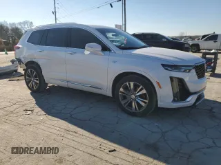 2021 Cadillac XT6 Premium Luxury with VIN 1GYKPDRS4MZ115888, listed as a Copart auction lot 88755015 with 123,314 mi miles and Salvage title. Bid and sale history available at DreamBid. Image 4.