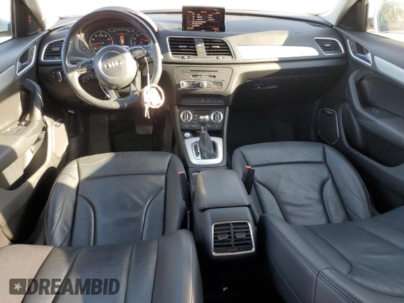 2015 Audi Q3 Prestige with VIN WA1FFCFS3FR001175, listed as a Copart auction lot 76915744 with 75,428 mi miles and Salvage title. Bid and sale history available at DreamBid. Image 8.