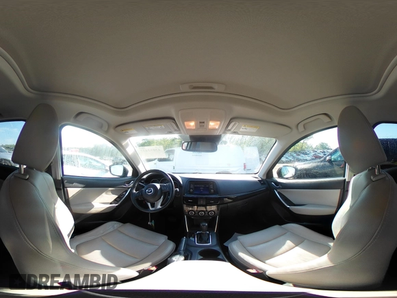 2014 Mazda CX-5 Grand Touring with VIN JM3KE2DY1E0424890, listed as a IAAI auction lot 42052437 with 107,793 mi miles. Bid and sale history available at carsss.com. Image 18.