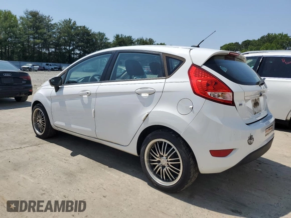 2012 Ford Fiesta SE z VIN 3FADP4EJ9CM148404, wystawiony jako Copart lot #59150695 z przebiegiem 84 705 mil mil oraz Czysty tytuł • Clean title. Historia ofert i sprzedaży dostępna na DreamBid. Obrazek 2.