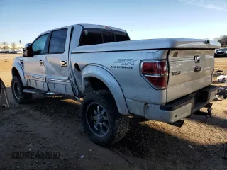 2013 Ford F-150 XLT with VIN 1FTFW1E64DFD34725, listed as a Copart auction lot 88887445 with 158,439 mi miles and Salvage Title. Bid and sale history available at carsss.com. Image 2.