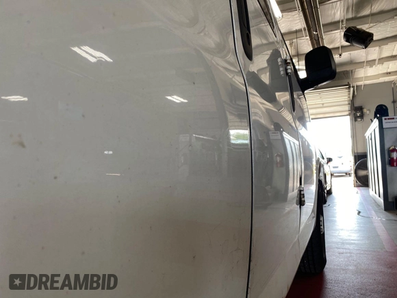 2014 Chevrolet Express Cargo with VIN 1GCWGFCA2E1184095, listed as a IAAI auction lot 42725036 with 270,636 mi miles and . Bid and sale history available at DreamBid. Image 32.