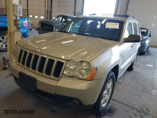 2010 Jeep Grand Cherokee Laredo with VIN 1J4RR4GT9AC106381, listed as a IAAI auction lot 41723268 with 180,008 mi miles. Bid and sale history available at carsss.com. Image 2.