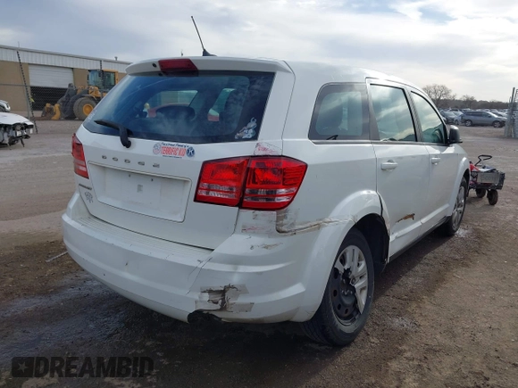 2014 Dodge Journey American Value with VIN 3C4PDCAB1ET209973, listed as a IAAI auction lot 41803864 with 168,774 mi miles and . Bid and sale history available at DreamBid. Image 4.
